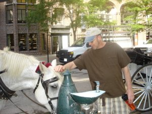 My Dad and the horse drinking at the horse water fountain : )